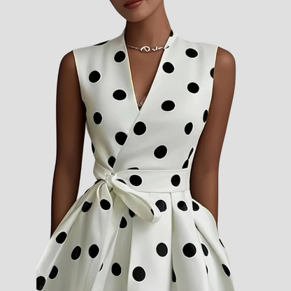 White Women's Midi Dress - Clarie, close-up of black polka dot bodice and wrap tie waist