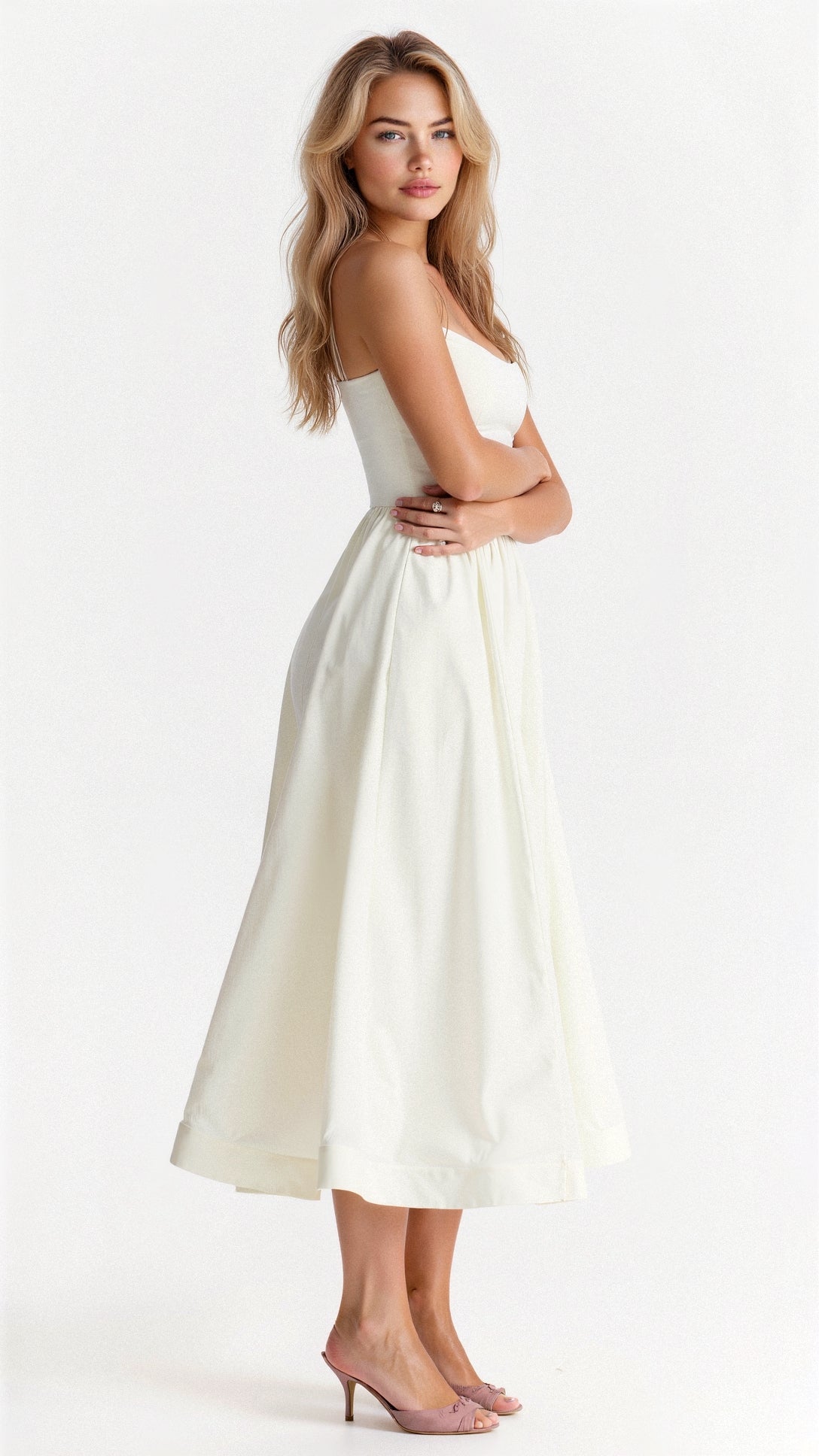 White Women's Midi Dress - Shanea seen from the side, showing the flowing A-line skirt