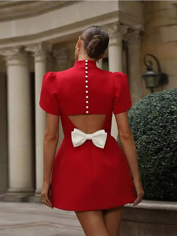 Red Mock Neck Cocktail Mini Dress back view with button placket and bow cutout