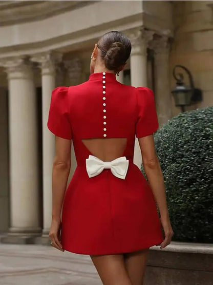 Red Mock Neck Cocktail Mini Dress back view with button placket and bow cutout