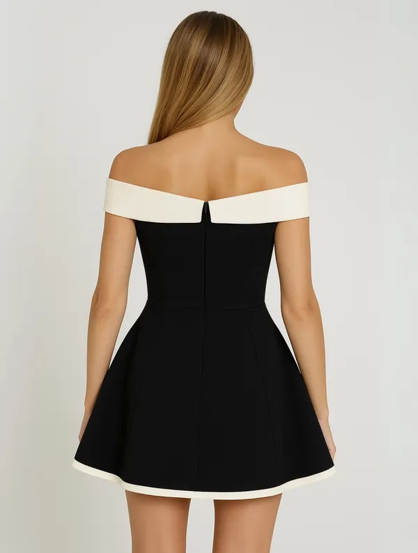 Black Off-Shoulder Contrast Mini Dress back view showing zip and flared skirt