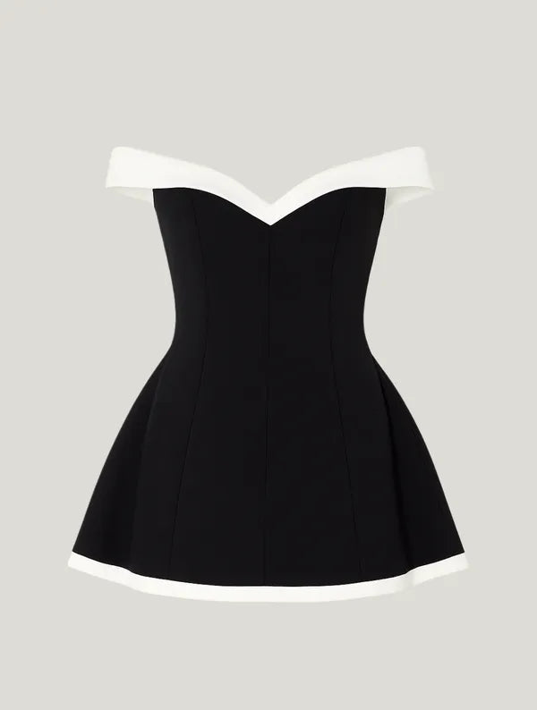 Black Off-Shoulder Contrast Mini Dress flatlay showing ivory trimmed hem and neckline