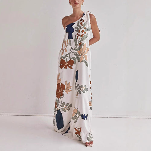 Kora apricot floral one shoulder maxi dress shown front-on with knotted shoulder tie
