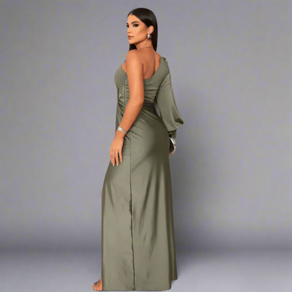 Back view of the Leonora green one shoulder front slit maxi dress on model
