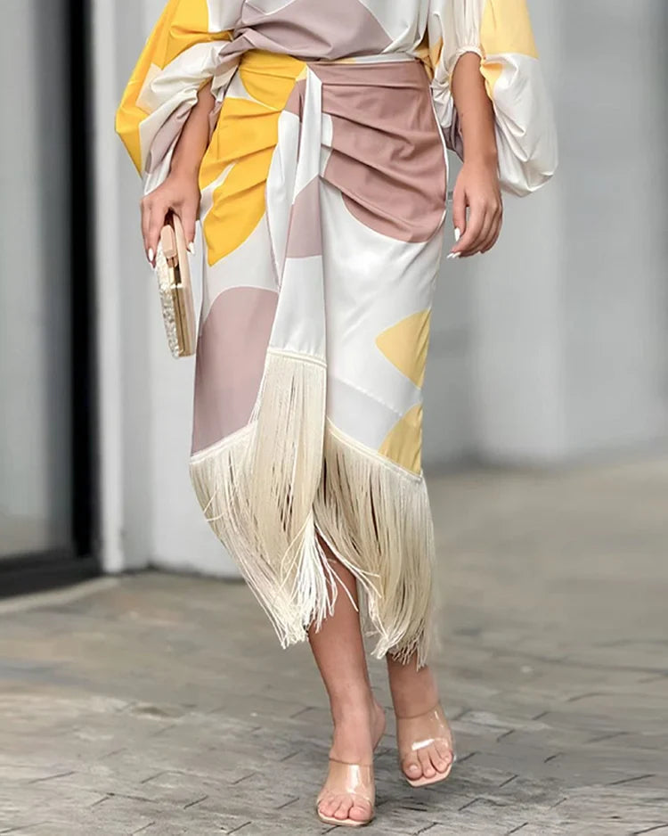Yellow Women's One Shoulder Midi Dress - Mariska, detail of the fringed hem and printed skirt