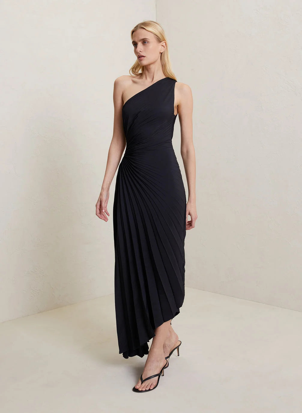 Inka black one-shoulder pleated maxi dress, elegant front view on model