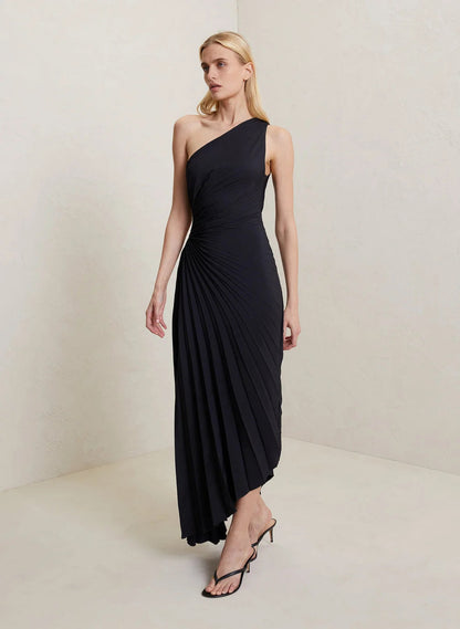 Inka black one-shoulder pleated maxi dress, elegant front view on model