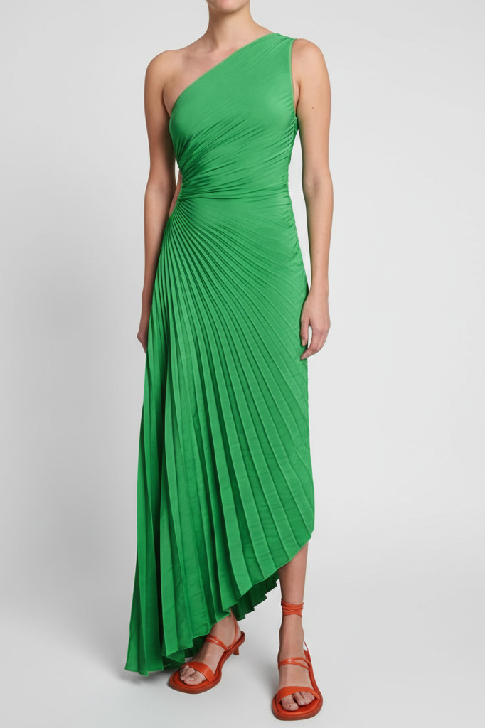 Inka green one-shoulder pleated maxi dress shown front-on with red sandals