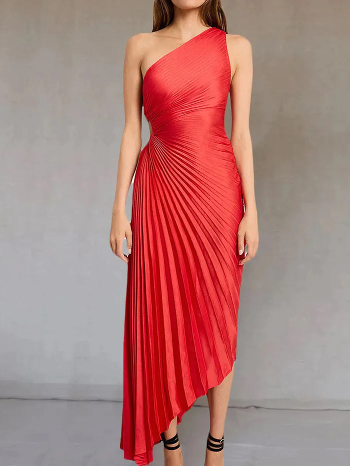 Red Inka pleated maxi dress with sunburst pleating, front-facing studio shot
