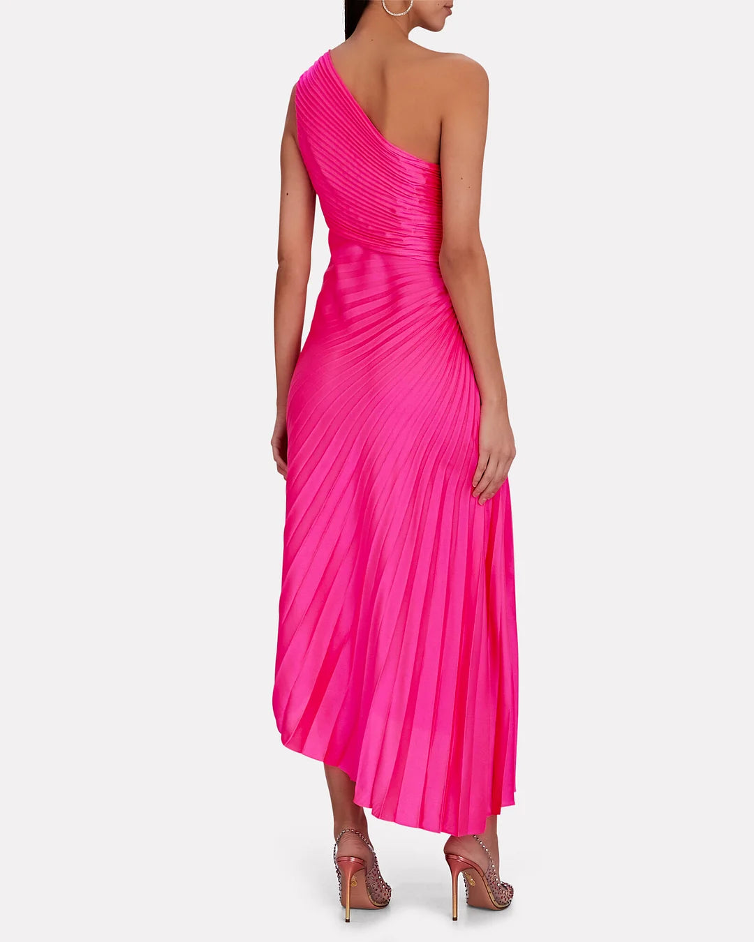Back view of the rose red Inka one-shoulder pleated maxi dress on model