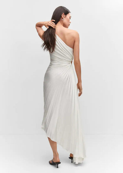Inka white pleated maxi dress seen from behind, model turning to the side