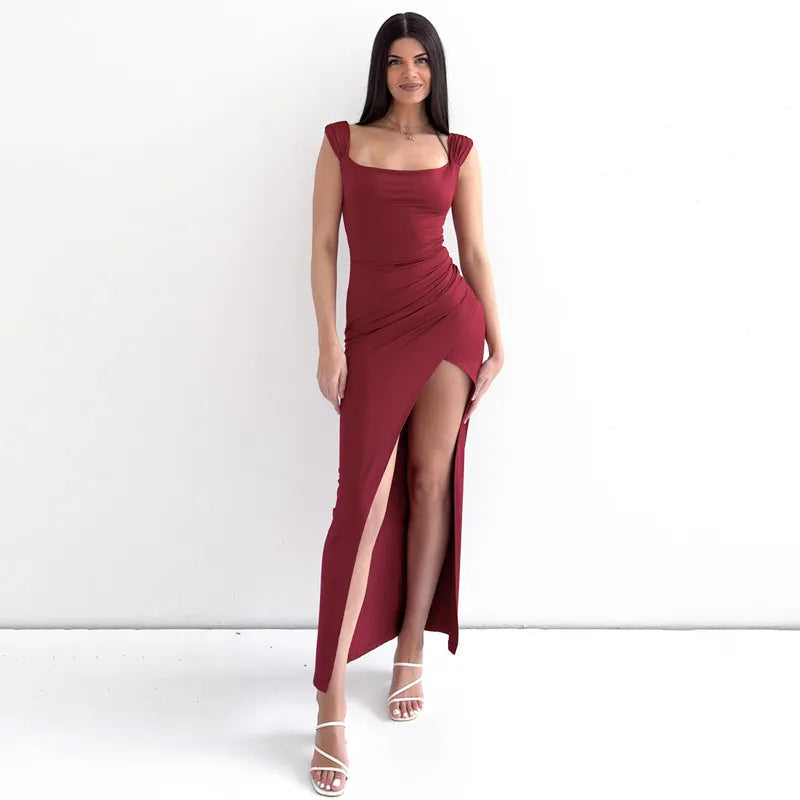 Oriana satin maxi dress in red with thigh-high slit, front view on model