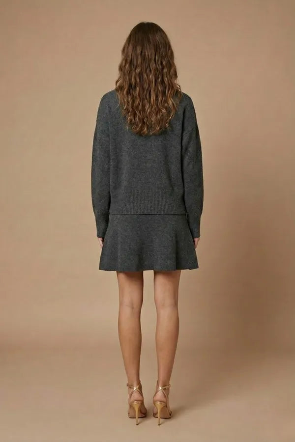 Carmina women's two-piece knit sweater and mini skirt set in gray, back view