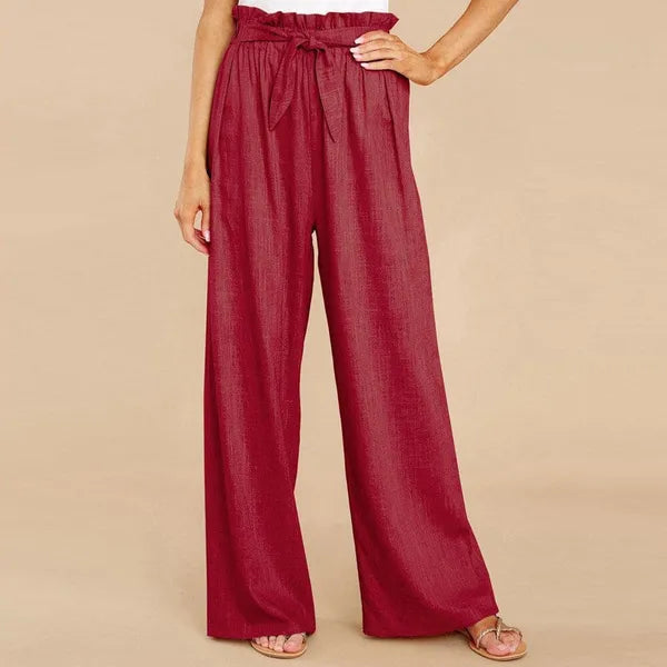 Fleur Women's Paperbag Waist Palazzo Pants in red, front view on model