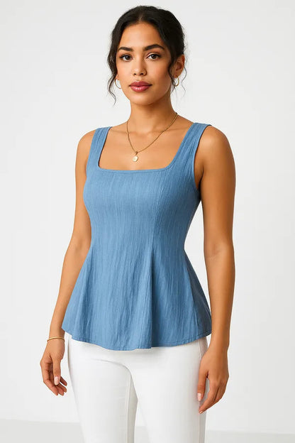Dominika Women's Peplum Sleeveless Top in blue, studio front view with square neckline