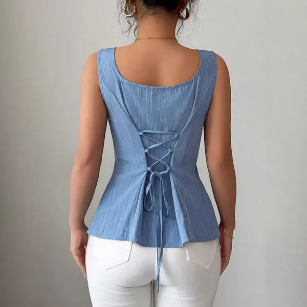 Dominika Women's Peplum Sleeveless Top in blue, back view of corset lace-up detail