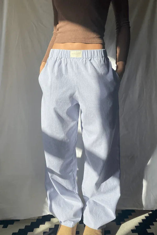 Belle Women's Pinstripe Pajama-Style Trousers in blue stripe, front view on model
