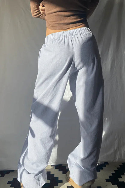 Belle Women's Pinstripe Pajama-Style Trousers in blue stripe, back view on model