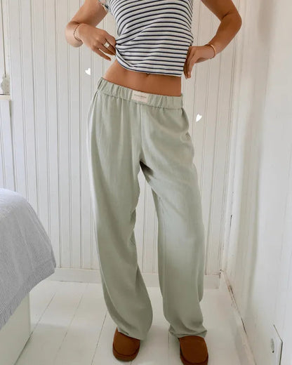 Belle Women's Pinstripe Pajama-Style Trousers in sage green, front view on model