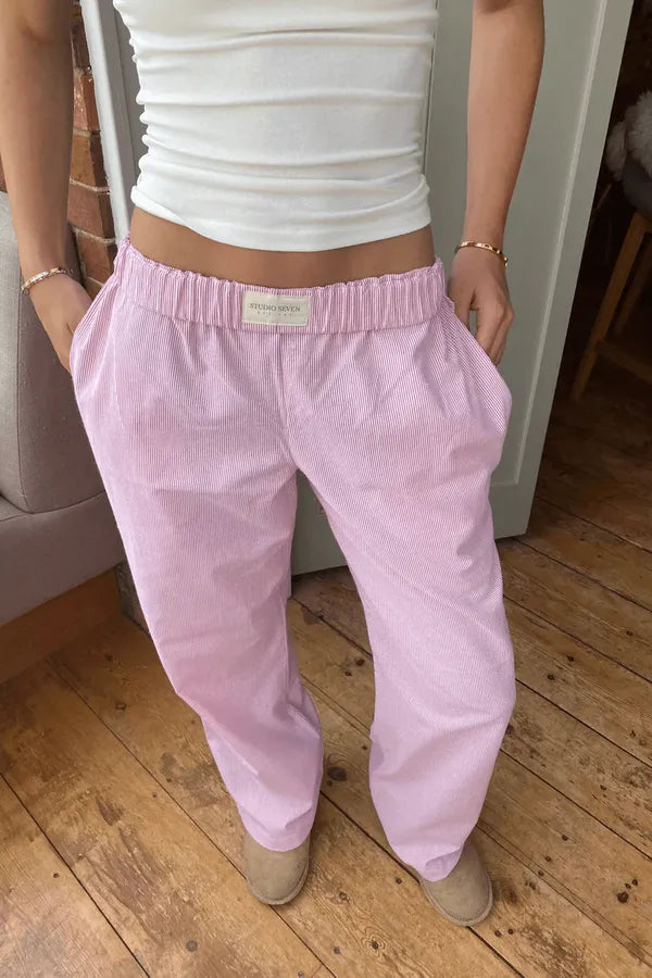 Belle Women's Pinstripe Pajama-Style Trousers in pink stripe, front view on model