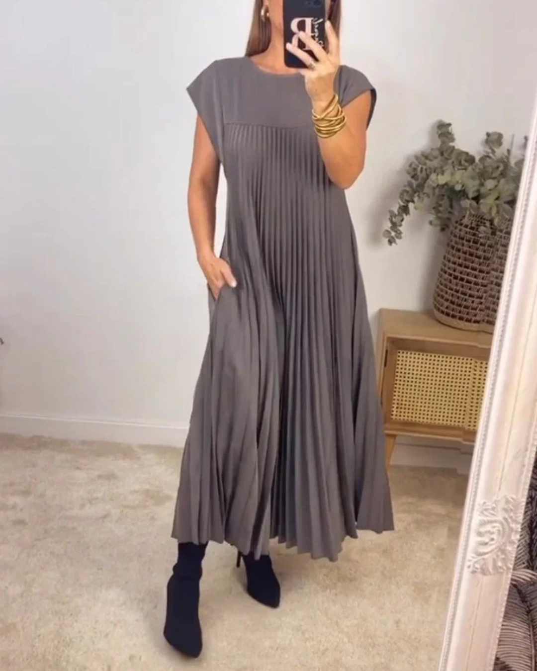 Mila pleated maxi dress in gray, front view showing the pleated panel