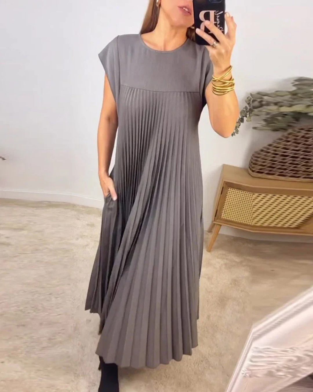 Gray Mila pleated maxi dress with cap sleeves, front-facing mirror shot