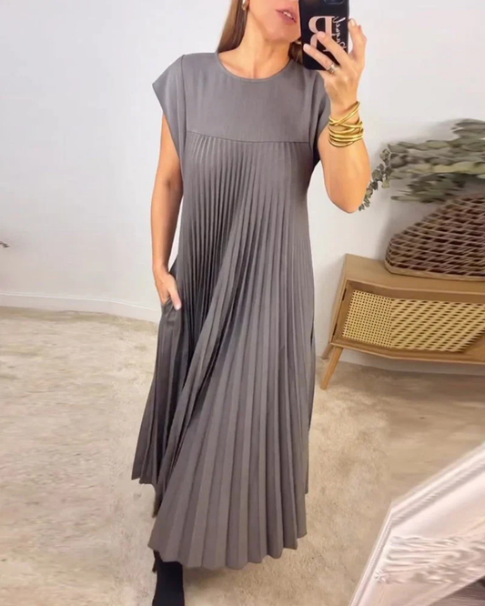 Gray Mila pleated maxi dress with cap sleeves, front-facing mirror shot