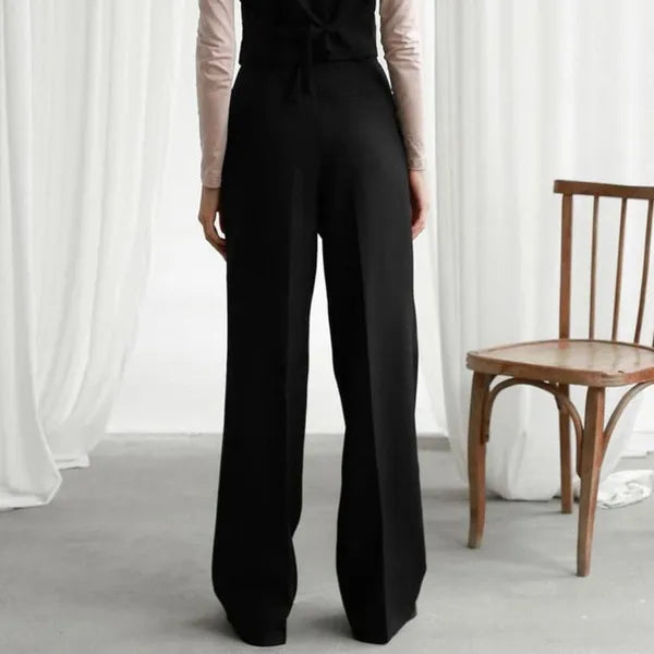 Valerial Women's Pleated Palazzo Pants in black, back view on model