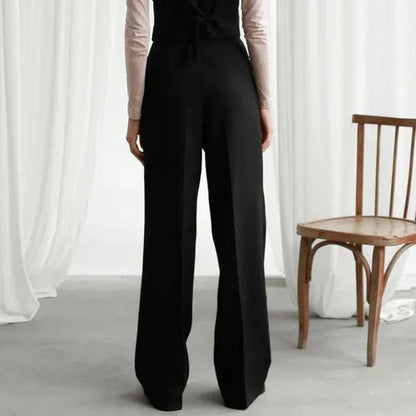 Valerial Women's Pleated Palazzo Pants in black, back view on model