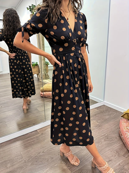Black Women's Polka Dot V Neck Midi Dress - Amaris, front view with tie-cuff short sleeves