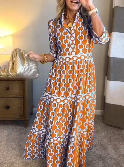 Ninon print blouson tiered maxi dress in orange, front-facing on model