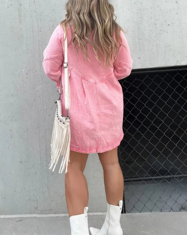 Pink Puff Sleeve Denim Mini Dress back view showing curved hem and seaming