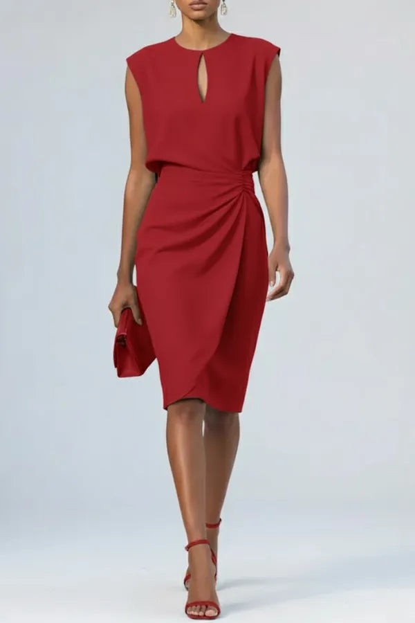 Sandy women's ruched midi dress in red, front view on model with clutch
