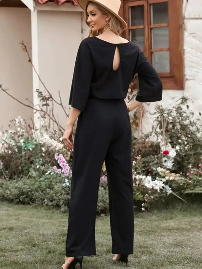 Black Harlene women's scuba knit casual jumpsuit, back view with keyhole detail