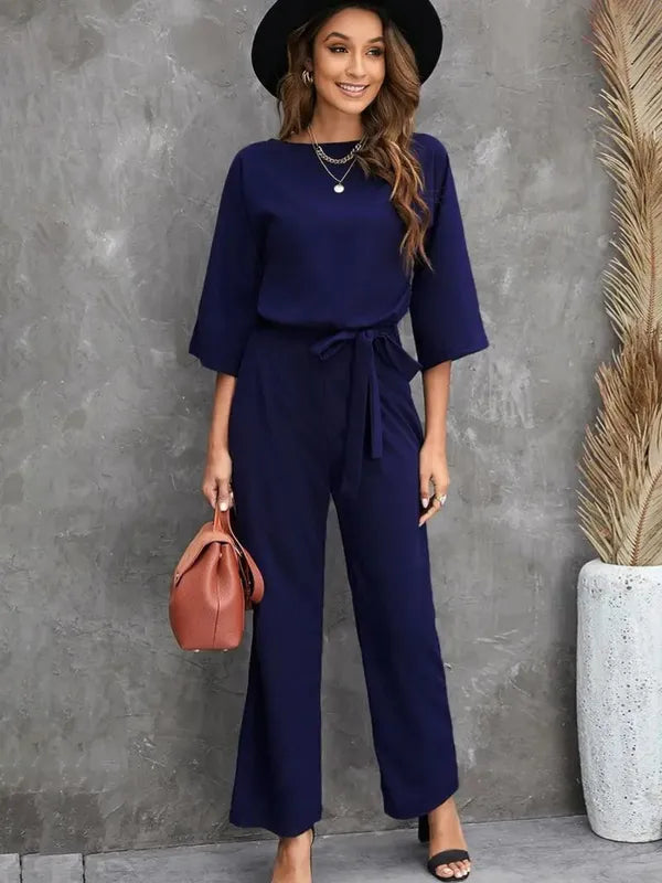 Navy blue Harlene women's scuba knit casual jumpsuit, full front view on model