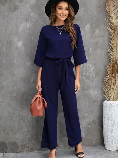 Navy blue Harlene women's scuba knit casual jumpsuit, full front view on model