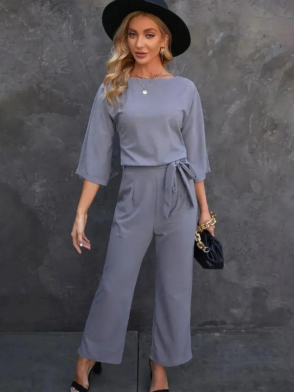 Dark gray Harlene women's scuba knit casual jumpsuit, front view with tie belt