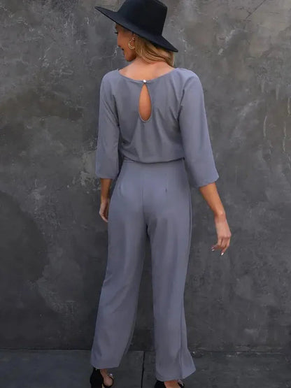 Dark gray Harlene scuba knit casual jumpsuit, back view of the keyhole opening