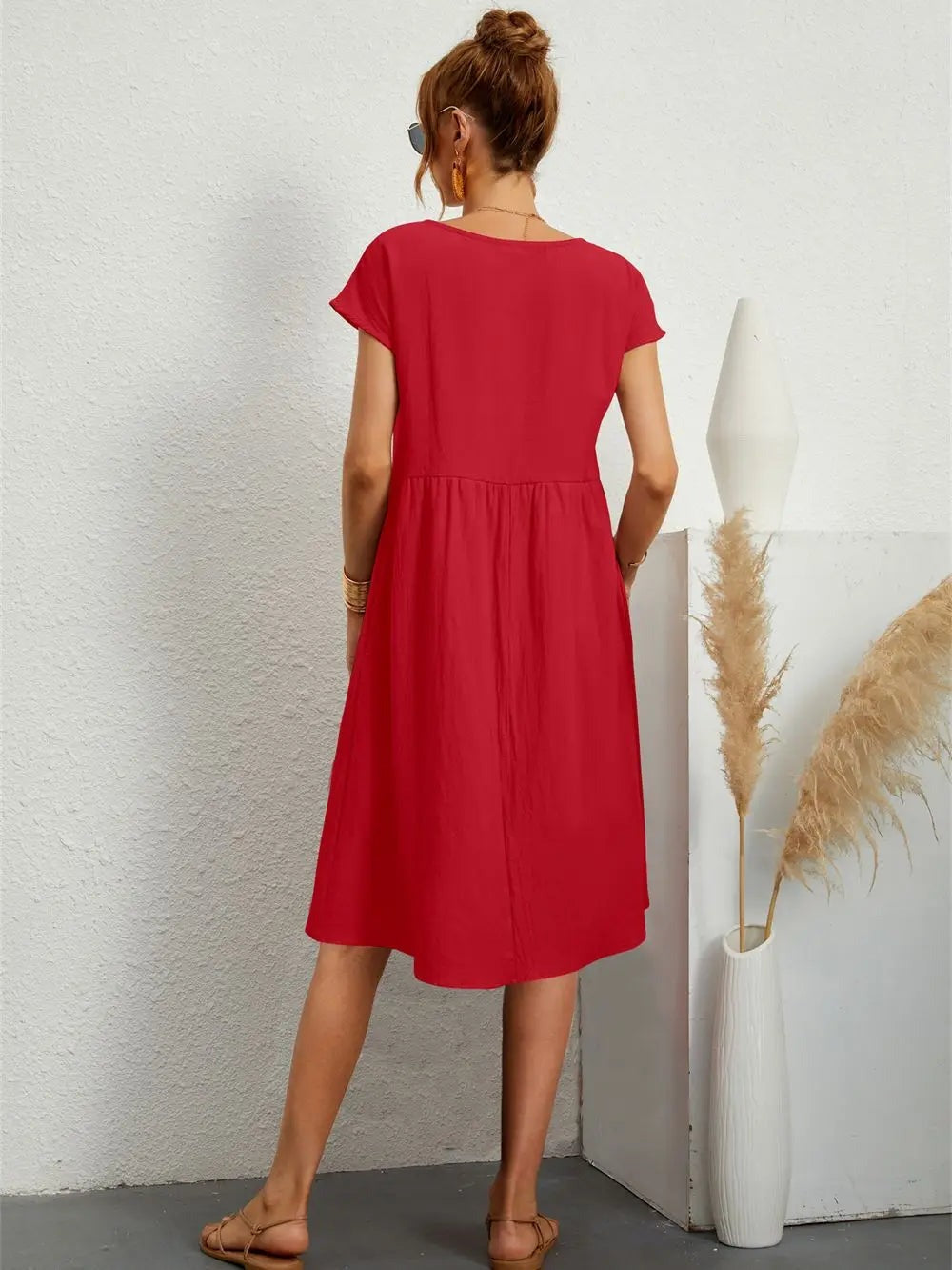 Henrietta women's shift summer midi dress in red, back view showing pockets