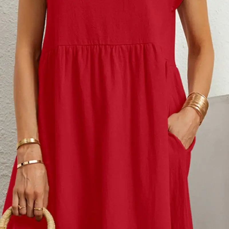 Henrietta women's shift summer midi dress in red, close-up detail of waist and pocket