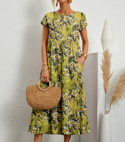 Anastazja women's short sleeve midi dress in yellow floral print, front view on model