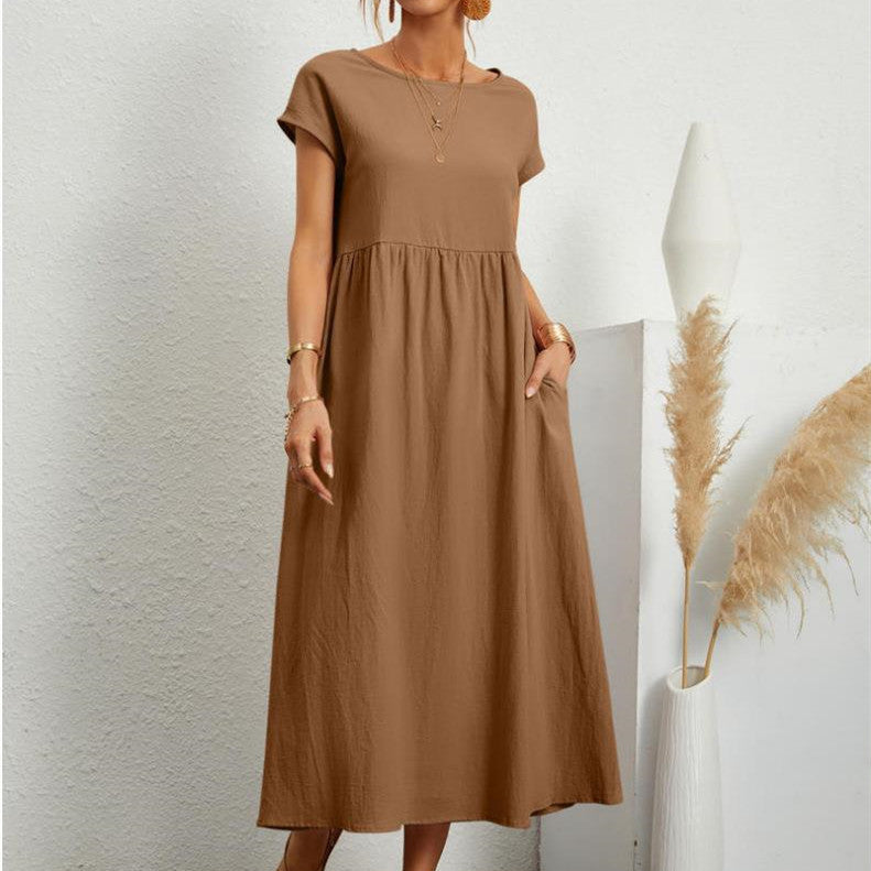 Esmeralda women's short sleeve midi dress in beige, front view on model