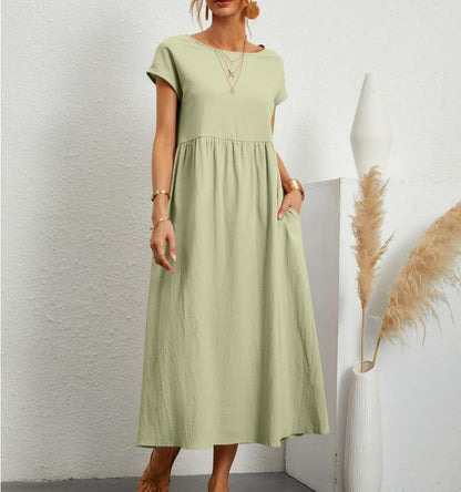 Esmeralda women's short sleeve midi dress in light green, front view on model