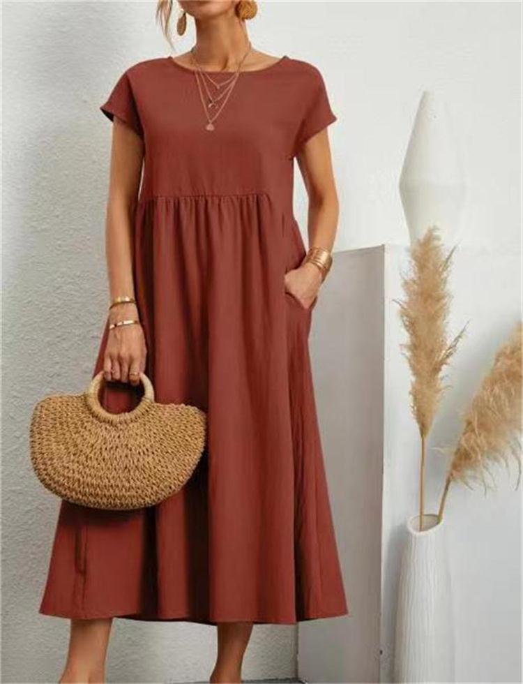 Esmeralda women's short sleeve midi dress in red, front view with straw bag