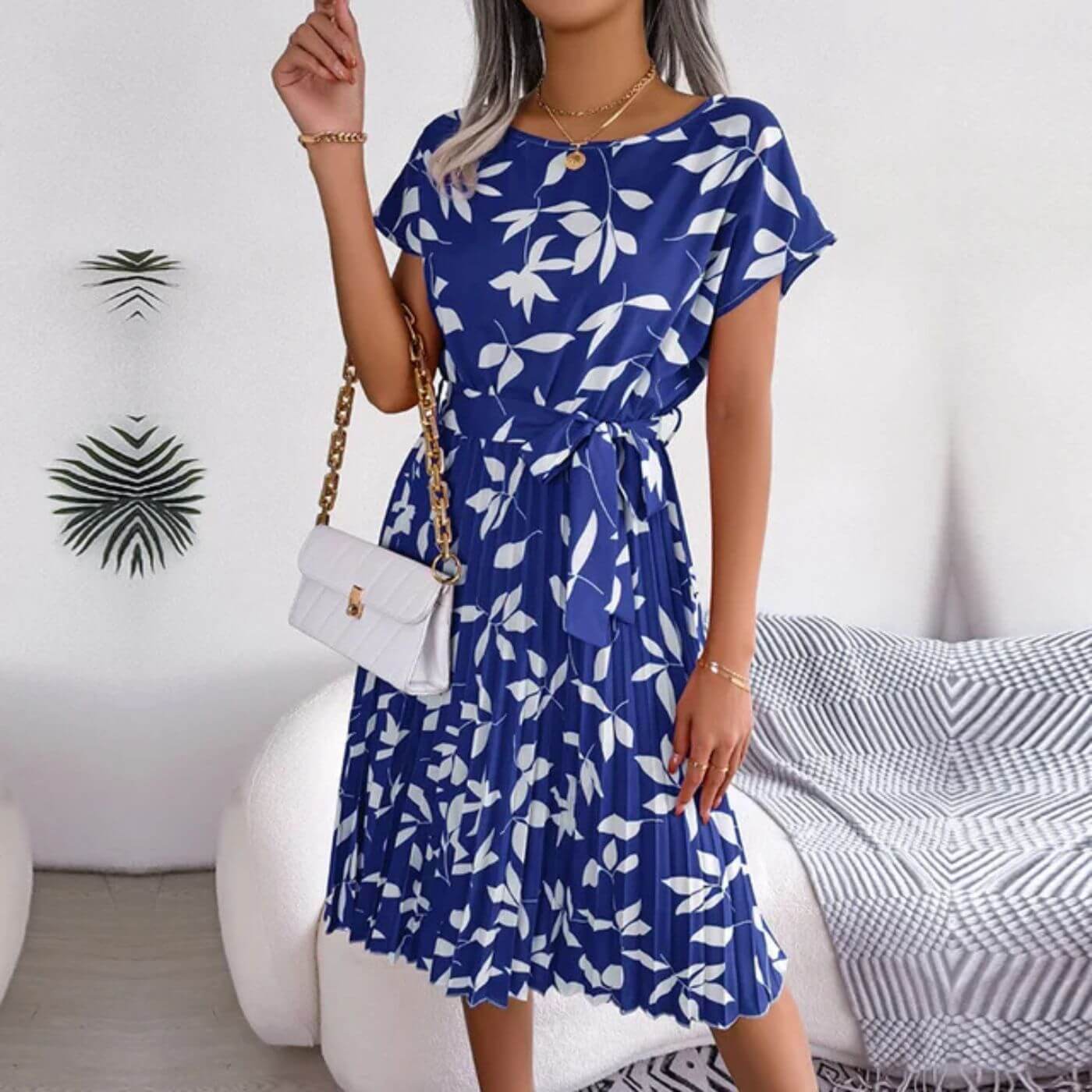 Jacinta women's short sleeve midi dress in royal blue leaf print, front view