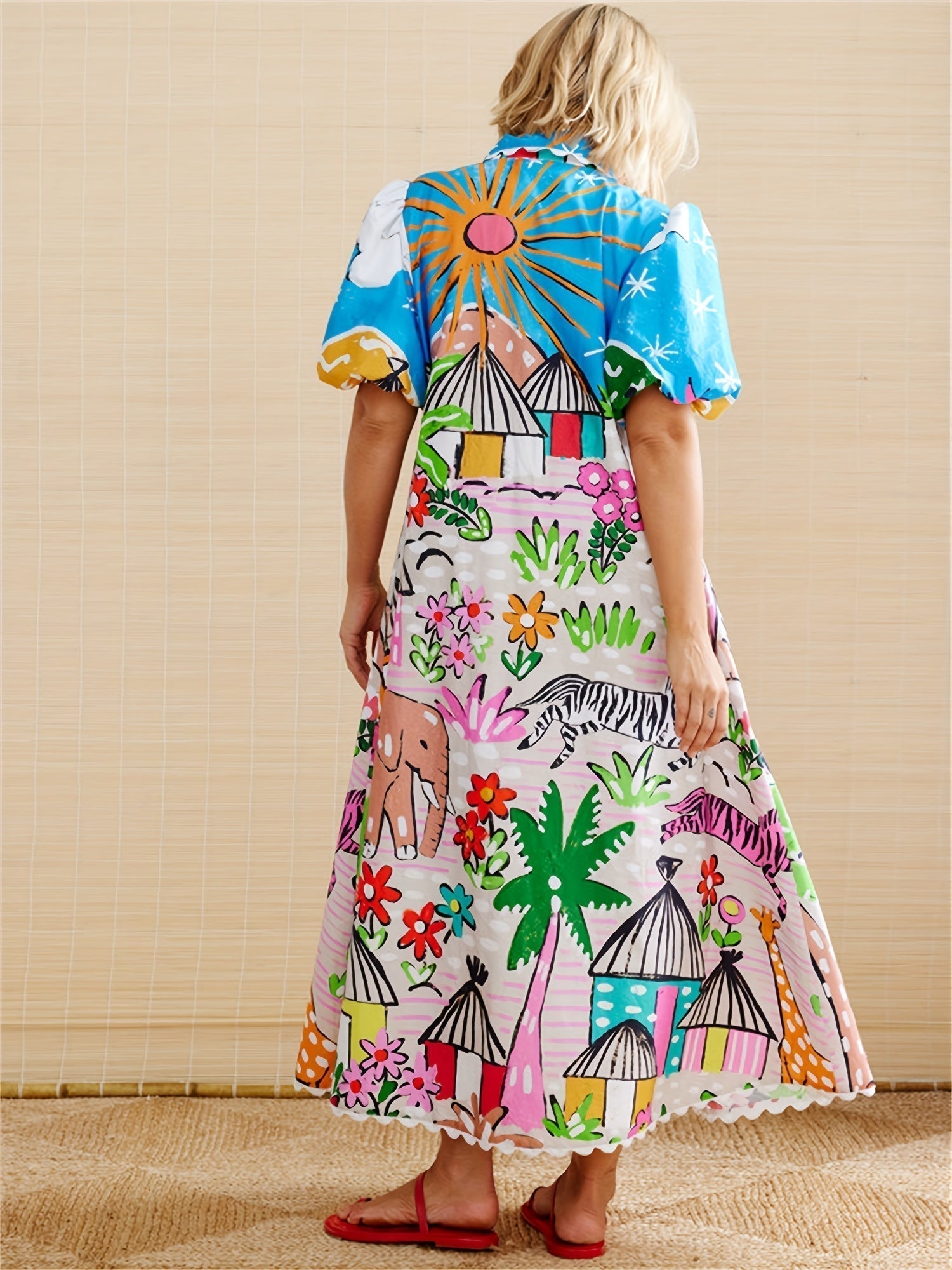 Back view of the multicolor Marjolaine printed shirt maxi dress on model