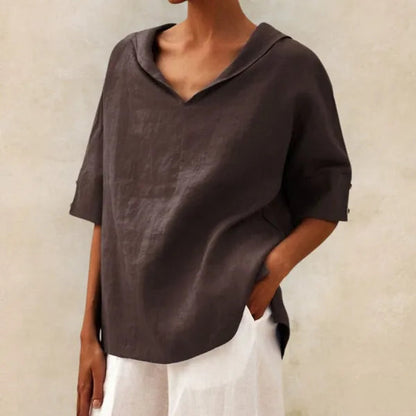 Women's Short Sleeve V Neck Blouse in dark Brown, front view on model – Soraya
