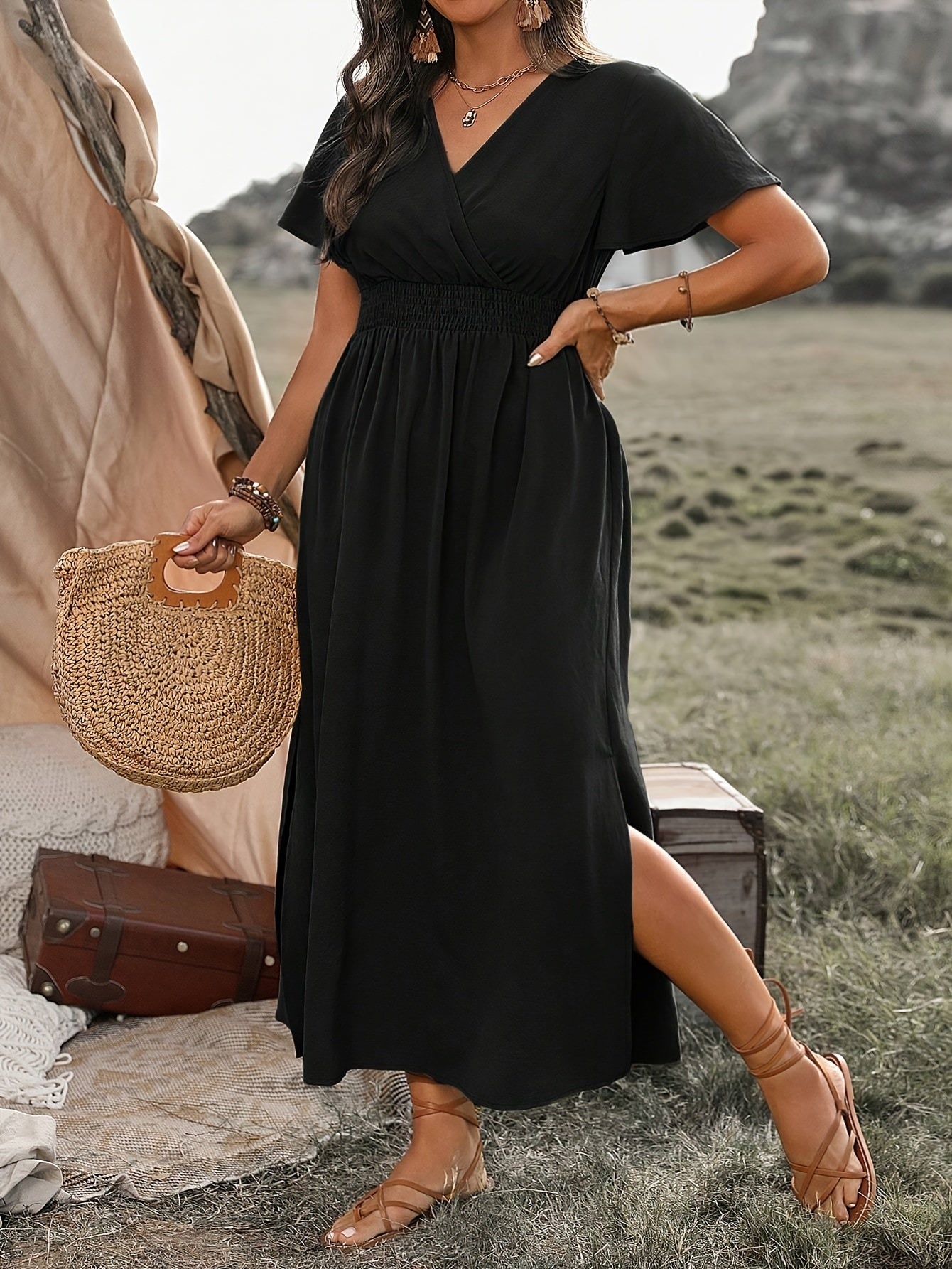Kaia wrap maxi dress in black with short sleeves, front view on model