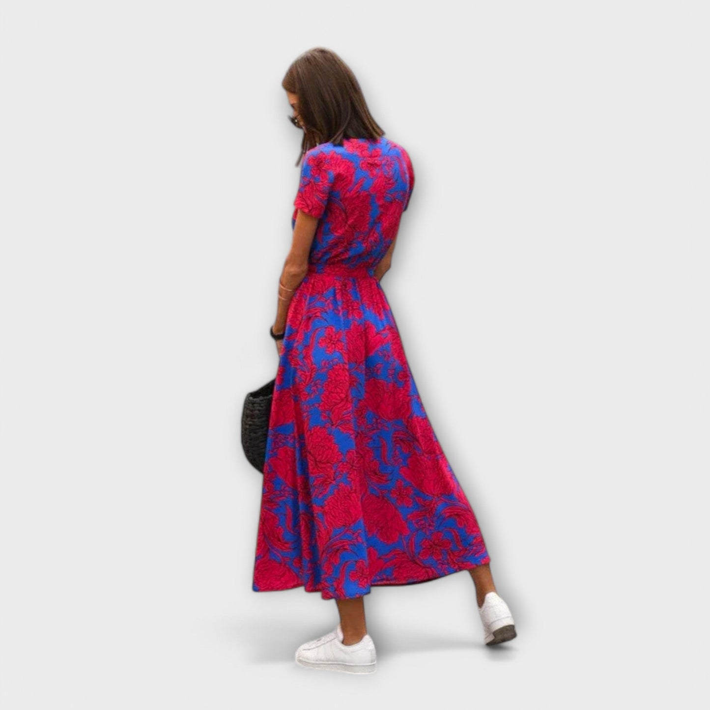 Mariz women's pleated midi dress in red and blue print, back view on model