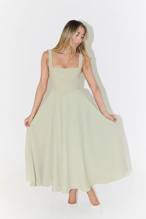Sage green Edmee A-line maxi dress with full skirt held out, front view